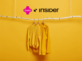 cabide de roupas amarelas com logo Livelo Insider