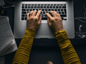 cropped-Business_Person-Working-on-Laptop_1302475706_jpg.png
