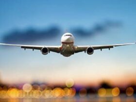 perspective view of jet airliner in flight with bokeh background
