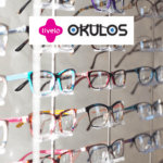 óculos exposto em loja com logo Livelo e Okulos