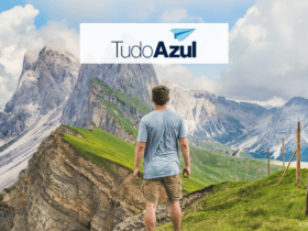 Homem olhando montanhas com logo TudoAzul Até 110% de bônus TudoAzul