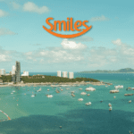 imagem aérea de uma cidade com a logo Smiles até 150% de bônus Smiles