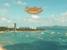 imagem aérea de uma cidade com a logo Smiles até 150% de bônus Smiles