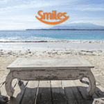 praia paradisíaca com logo Smiles bônus Smiles