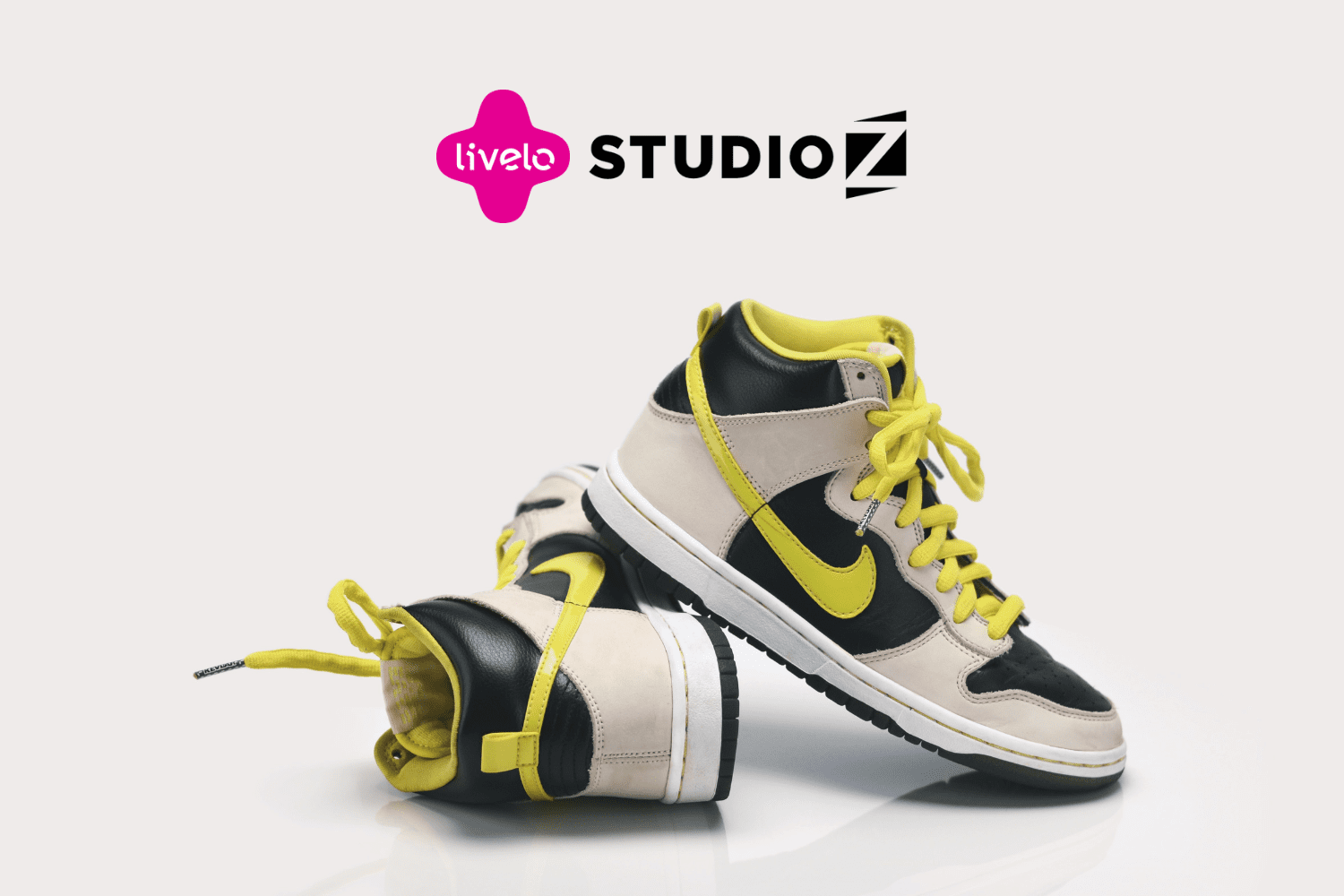 calçados com logo Livelo e Studio z 8 pontos Livelo