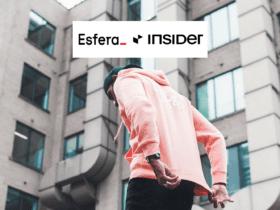 homem utilziando casaco rosa com logo Esfera e Insider 8 pontos Esfera