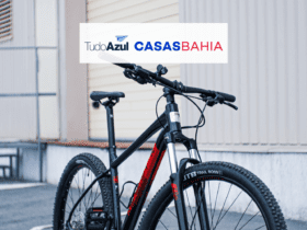 bicicleta com logo TudoAzul e Casas bahia 14 pontos TudoAzul