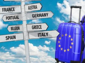 depositphotos_53287043-stock-photo-travel-concept-suitcases-and-signpost