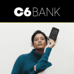 mulher segudando um celular com logo C6 Bank
