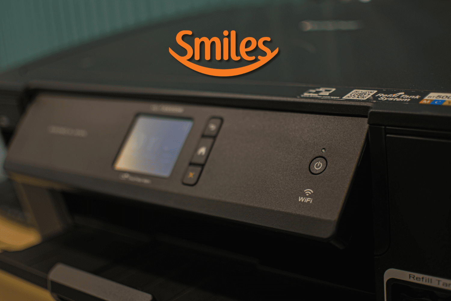 impressora com logo Smiles Pontos Smiles