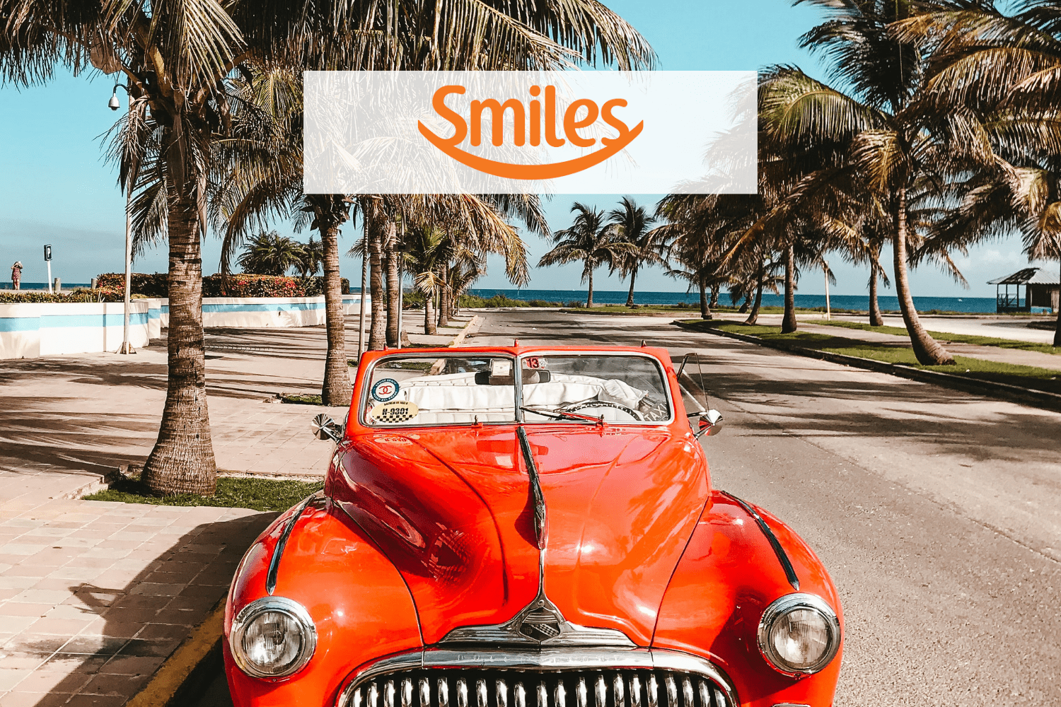 carro laranja com logo Smiles pontos Smiles