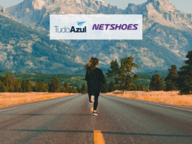 mulher correndo na estrada com logo TudoAzul e Netshoes 12 pontos TudoAzul