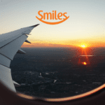 avião no ar com logo Smiles Bônus Smiles